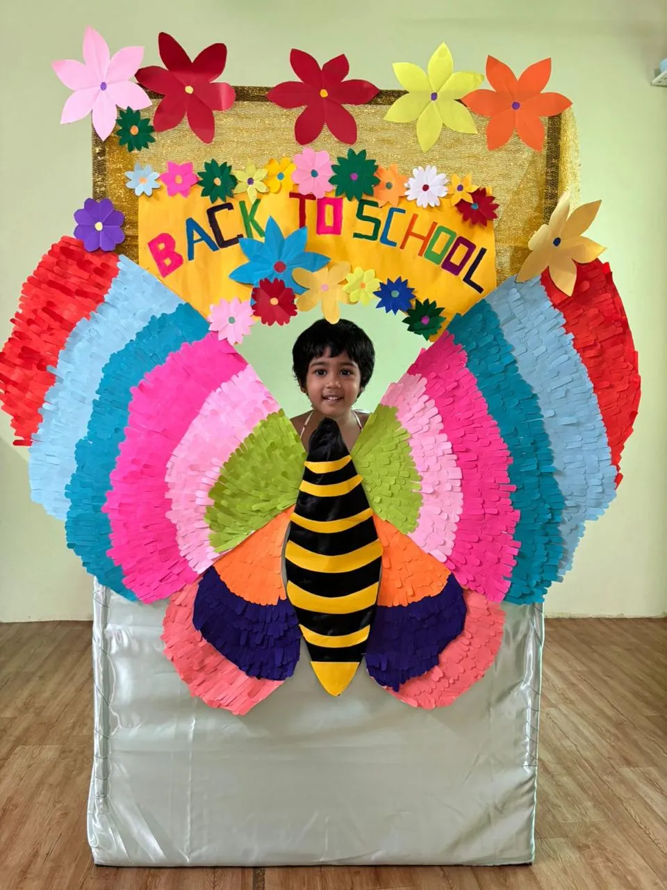 A child in a colourful Back to School photo frame