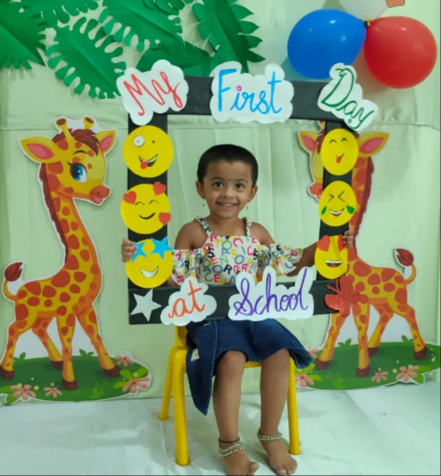 A smiling child on their first day at Kidzlore